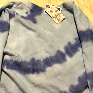 Blue tie dye top with tag still on